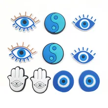New jibz 1pcs cartoon evil eye Shoe Charms DIY Tai Chi clogs Shoe Aceessories Fit croc Sandals Decorate buckle Unisex kids Gifts